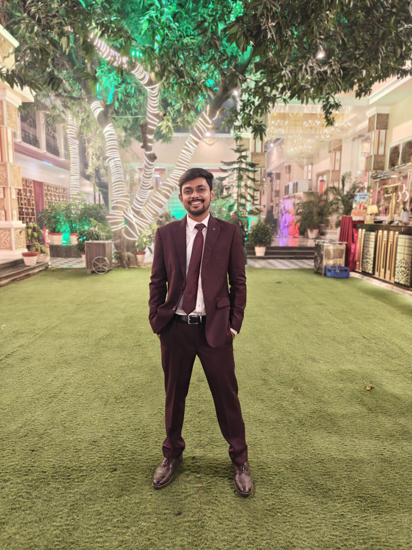 Chitranshi in a maroon suit